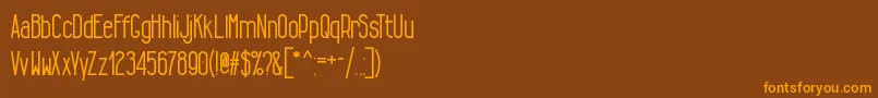 TallLean Font – Orange Fonts on Brown Background