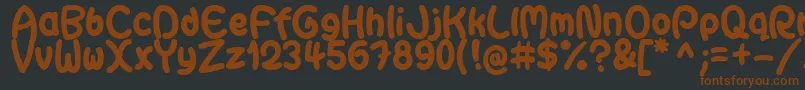 GaiteraBallDemoFfp-fontti – ruskeat fontit mustalla taustalla