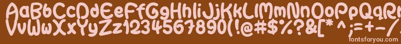 GaiteraBallDemoFfp-Schriftart – Rosa Schriften auf braunem Hintergrund