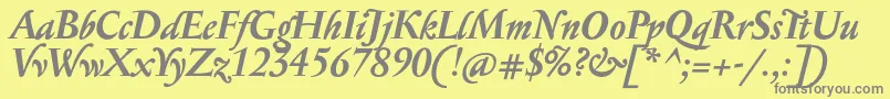 フォントSerapioniitxnBolditalic – 黄色の背景に灰色の文字