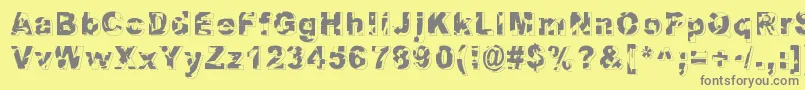 Dystopia Font – Gray Fonts on Yellow Background