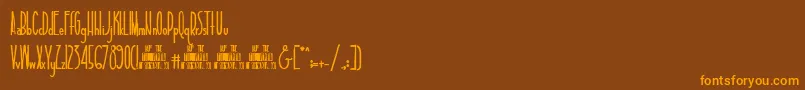 TallAndSlim Font – Orange Fonts on Brown Background