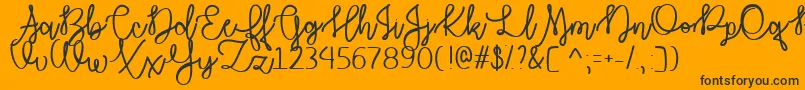 AutumnMoonTtf-Schriftart – Schwarze Schriften auf orangefarbenem Hintergrund