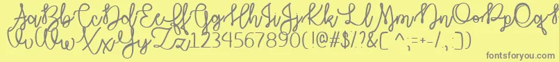 AutumnMoonTtf-fontti – harmaat kirjasimet keltaisella taustalla