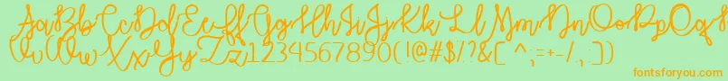 AutumnMoonTtf-Schriftart – Orangefarbene Schriften auf grünem Hintergrund