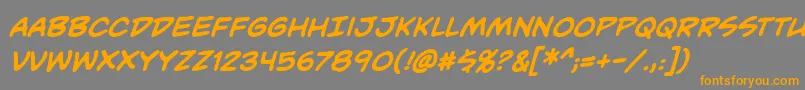 フォントUnmaskedBbBold – オレンジの文字は灰色の背景にあります。