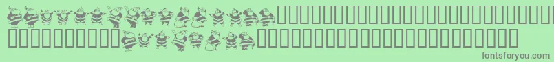 フォントKrEightSantas – 緑の背景に灰色の文字