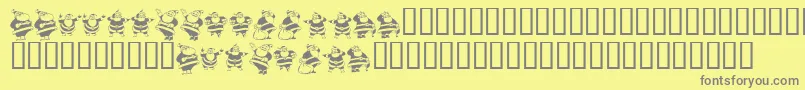 Fonte KrEightSantas – fontes cinzas em um fundo amarelo