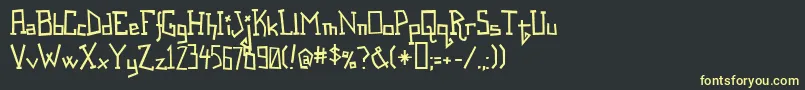 フォントSpastic – 黒い背景に黄色の文字