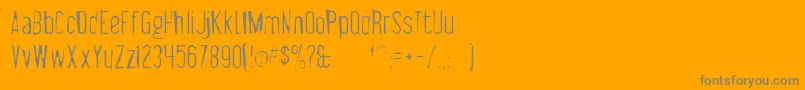 Libelsuitgaunt-fontti – harmaat kirjasimet oranssilla taustalla
