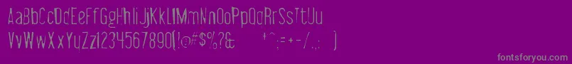 フォントLibelsuitgaunt – 紫の背景に灰色の文字