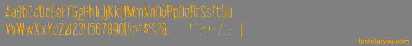 Шрифт Libelsuitgaunt – оранжевые шрифты на сером фоне