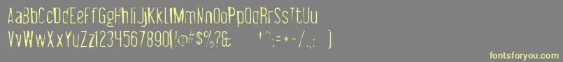 Libelsuitgaunt Font – Yellow Fonts on Gray Background