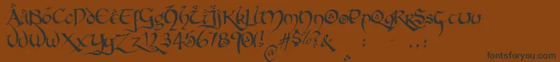 HobbitonBrushhandhobbitonBrush Font – Black Fonts on Brown Background