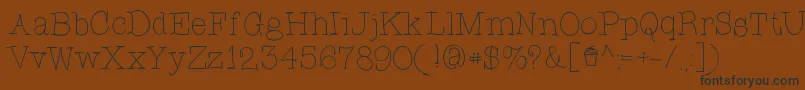 CupcakeFont Font – Black Fonts on Brown Background