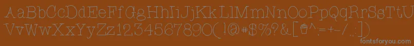 fuente CupcakeFont – Fuentes Grises Sobre Fondo Marrón