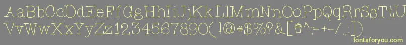 CupcakeFont Font – Yellow Fonts on Gray Background