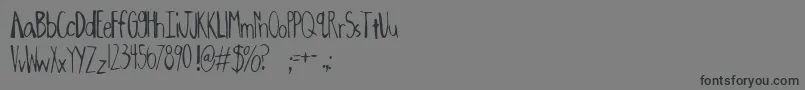 Oxalic ffy-Schriftart – Schwarze Schriften auf grauem Hintergrund