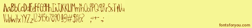 Oxalic ffy-Schriftart – Braune Schriften auf gelbem Hintergrund