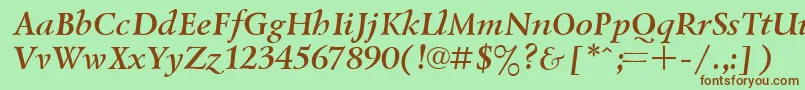 フォントUkrainiangoudyoldBolditalic – 緑の背景に茶色のフォント