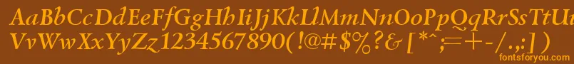 Czcionka UkrainiangoudyoldBolditalic – pomarańczowe czcionki na brązowym tle