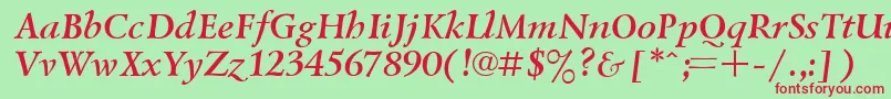 Czcionka UkrainiangoudyoldBolditalic – czerwone czcionki na zielonym tle