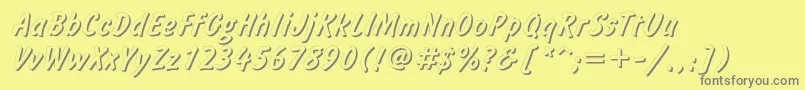 フォントInformshadowc – 黄色の背景に灰色の文字