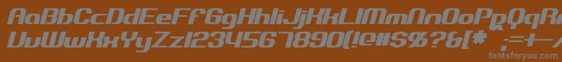 ExplorienItalic-fontti – harmaat kirjasimet ruskealla taustalla