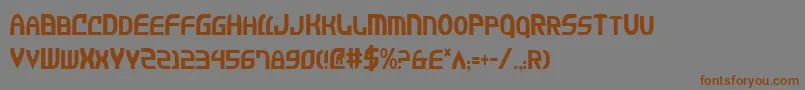 フォントJannv2c – 茶色の文字が灰色の背景にあります。