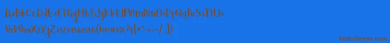 BmdLovegood Font – Brown Fonts on Blue Background
