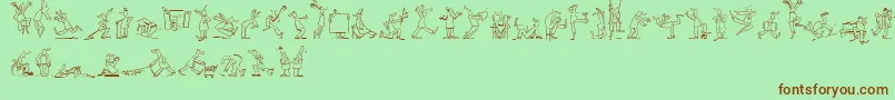 フォントMaennekenLtOutline – 緑の背景に茶色のフォント