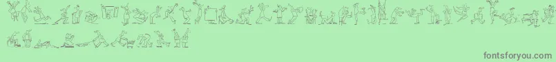 フォントMaennekenLtOutline – 緑の背景に灰色の文字