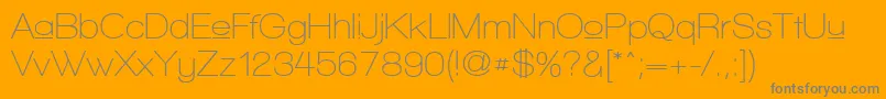 WalkwayUpperSemibold-Schriftart – Graue Schriften auf orangefarbenem Hintergrund