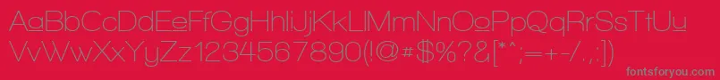 WalkwayUpperSemibold-Schriftart – Graue Schriften auf rotem Hintergrund