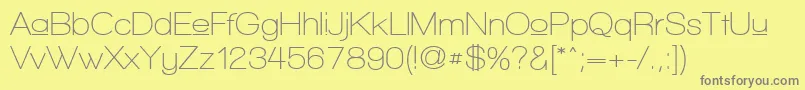 WalkwayUpperSemibold-fontti – harmaat kirjasimet keltaisella taustalla