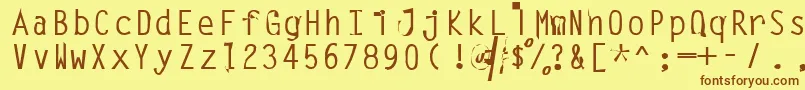 Leak Font – Brown Fonts on Yellow Background