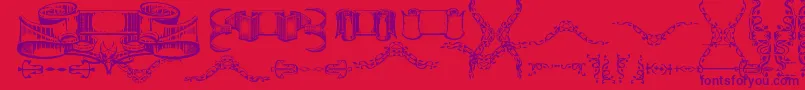 DeborahExtrasOrnaments Font – Purple Fonts on Red Background