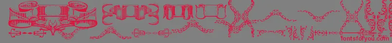 DeborahExtrasOrnaments Font – Red Fonts on Gray Background
