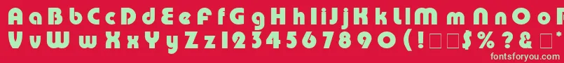 PumpRus-Schriftart – Grüne Schriften auf rotem Hintergrund