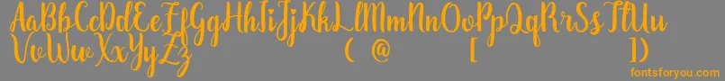 ZaheeraDemo Font – Orange Fonts on Gray Background