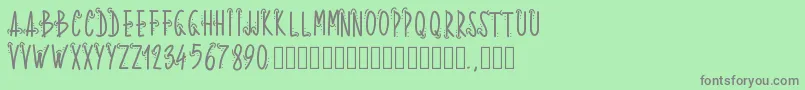 フォントPwwhoops – 緑の背景に灰色の文字