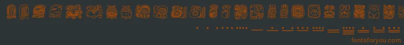 Czcionka Mayamonthglyphs – brązowe czcionki na czarnym tle