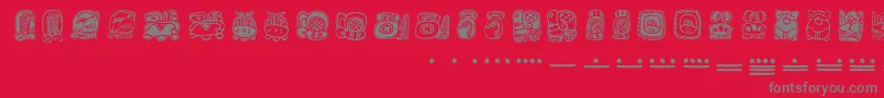 Mayamonthglyphs-Schriftart – Graue Schriften auf rotem Hintergrund
