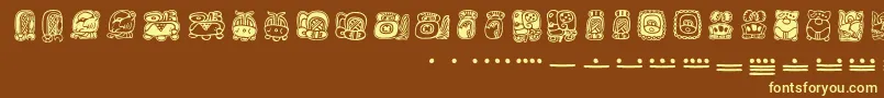 Mayamonthglyphs-Schriftart – Gelbe Schriften auf braunem Hintergrund