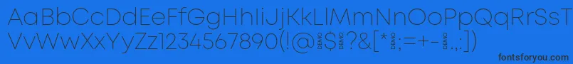 MontExtralightdemo Font – Black Fonts on Blue Background