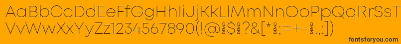 MontExtralightdemo Font – Black Fonts on Orange Background