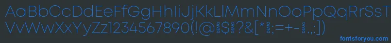 Шрифт MontExtralightdemo – синие шрифты на чёрном фоне