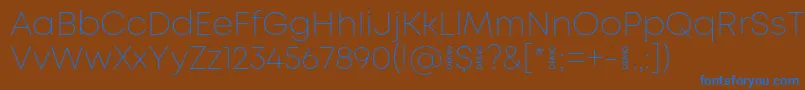Шрифт MontExtralightdemo – синие шрифты на коричневом фоне