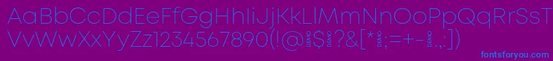 フォントMontExtralightdemo – 紫色の背景に青い文字