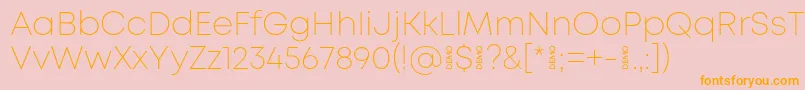 MontExtralightdemo-Schriftart – Orangefarbene Schriften auf rosa Hintergrund